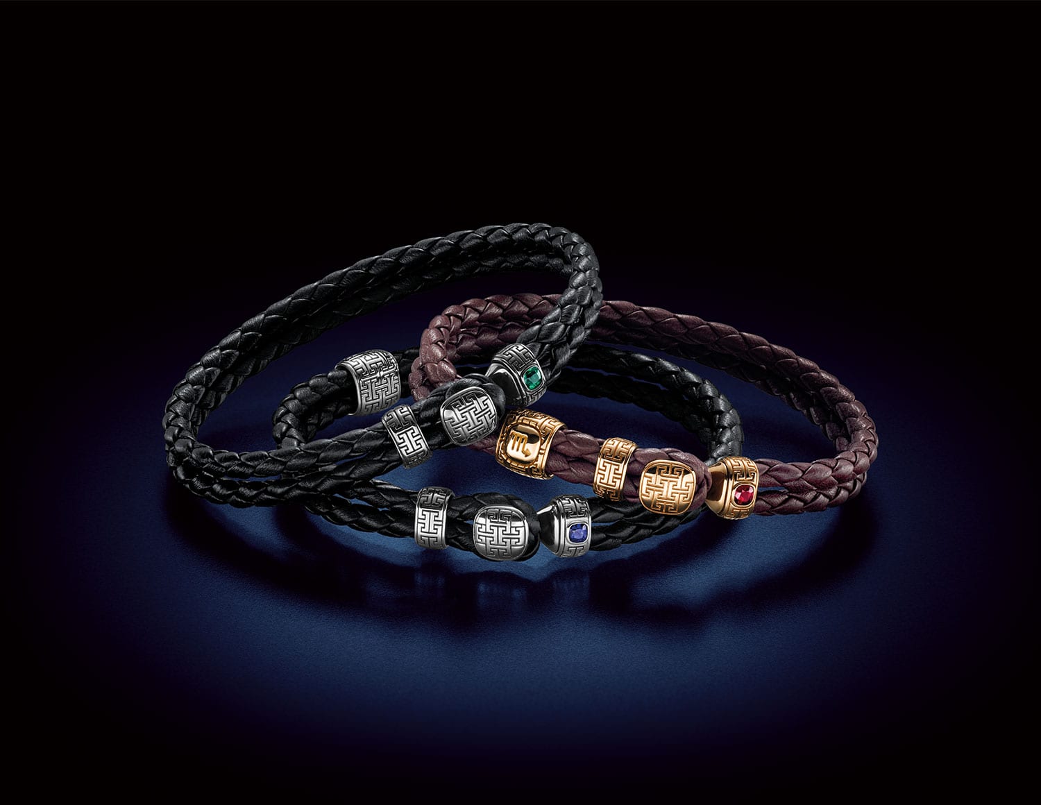 Drei MAGIOR Mystique Gem Armbänder in Schwarz und Bordeaux mit Smaragd, Saphir und Rubin auf den Schließen